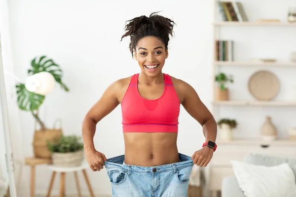 Customer showing weight loss transformation